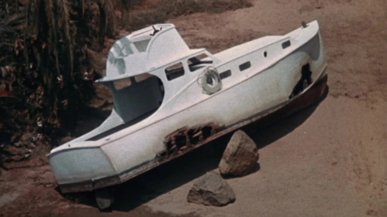 The S.S. Minnow, washed up on a beach, as seen in the opening credits of Gilligan's Island