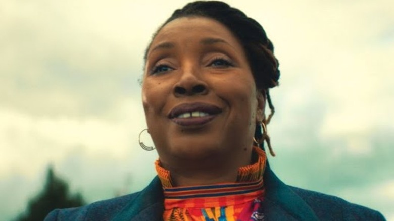 Jo Martin as the Fugitive Doctor smiling on Doctor Who