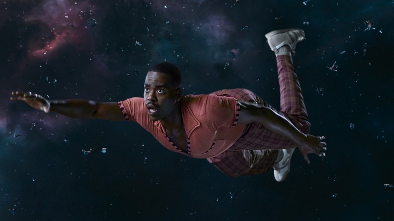 Ncuti Gatwa as the Doctor floating through space on Doctor Who