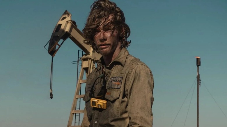 Cooper Norris with oil on face on Landman