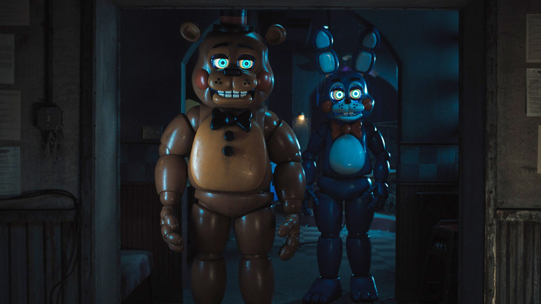 Freddy Fazbear and Bonnie the Bunny walking through a doorway in Five Nights at Freddy's 2