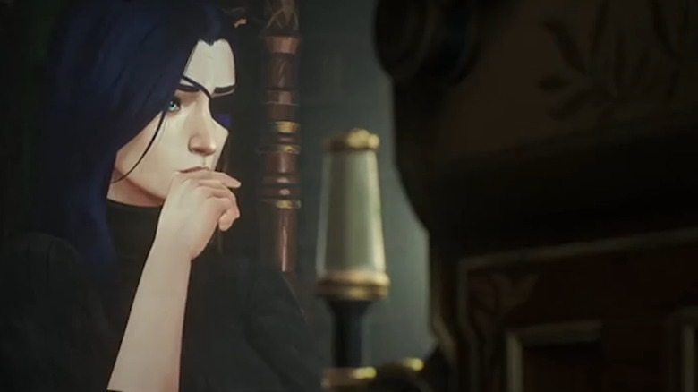 Caitlyn watches carefuly at a screen in Arcane