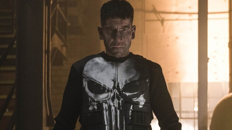 The Punisher showing off his skull emblem attire in The Punisher