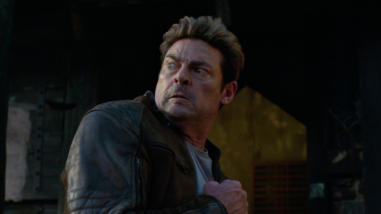 Karl Urban as Johnny Cage looking scared during a fight in Mortal Kombat II