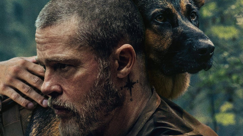Brad Pitt as James with Odin the dog on the poster for Heart of the Beast