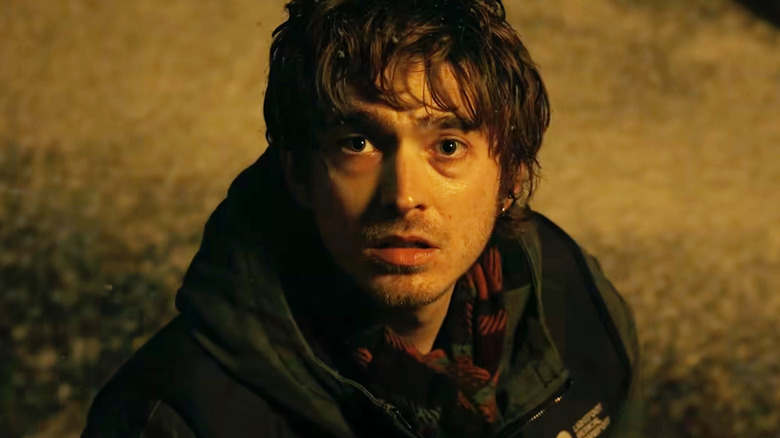 Austin Abrams as Bryan standing in a hospital in Resident Evil (2026)