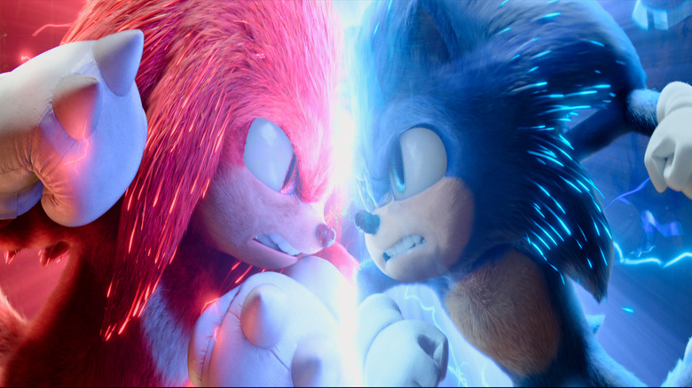 Knuckles (voiced by Idris Elba) and Sonic (Ben Schwartz) battle in search of the Master Emerald