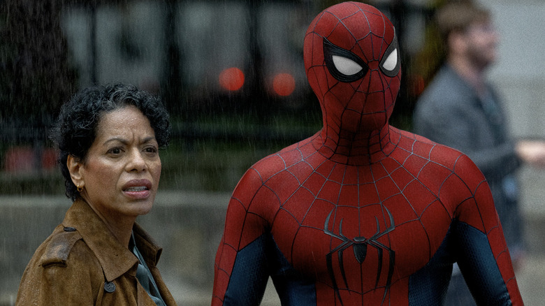 Detective DeWolff (Liza Colón-Zayas) next to Spider-Man at a crime scene in Spider-Man: Brand New Day