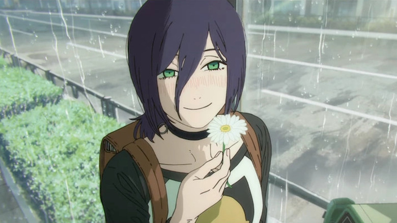 Reze holding up a flower in Chainsaw Man - The Movie: Reze Arc