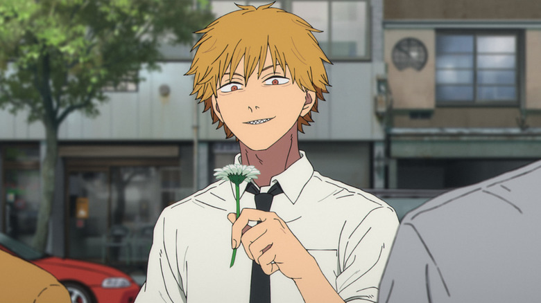 Denji holding a pretty flower in Chainsaw Man - The Movie: Reze Arc