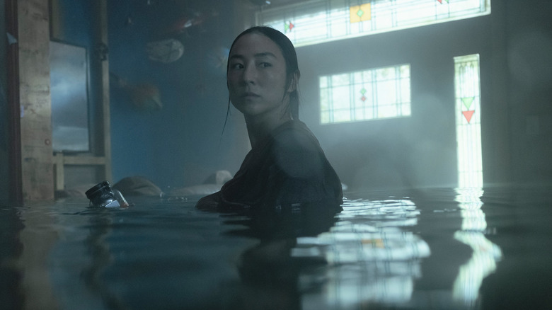 Ann in a flooded house in The Last House