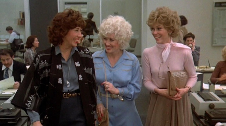 Dolly Parton as Doreen Rhodes, Lily Tomlin as Violet Newstead and Jane Fonda as Judy Bernly share a laugh at the office in 9 to 5