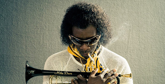 Don Cheadle as Miles Davis