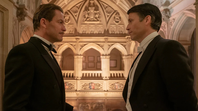 Dominic West and Rob James-Collier talking to one another in Downton Abbey: A New Era
