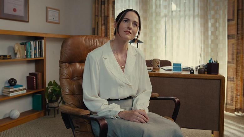 Mary sitting in her office in Backrooms