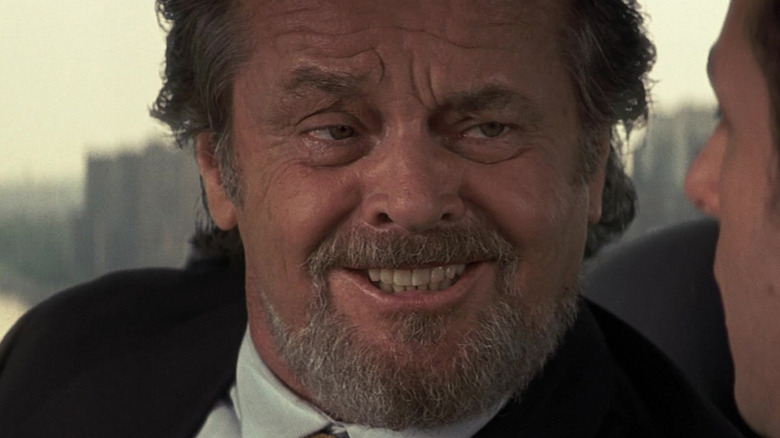 Jack Nicholson's Dr. Buddy Rydell is seen singing in closeup while sitting in a car in Anger Management