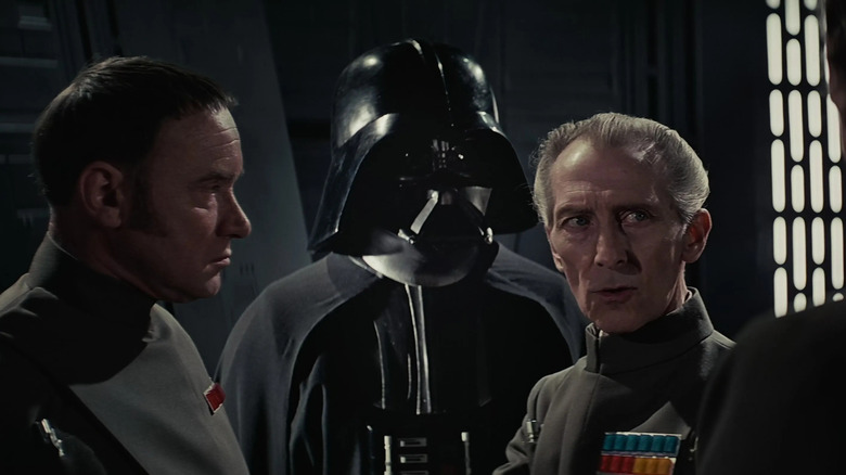 Darth Vader and Grand Moff Tarkin having an intense conversation in Star Wars