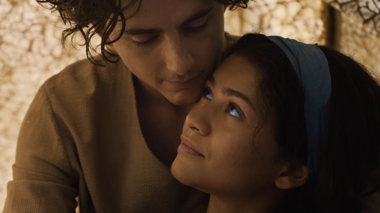Timotheé Chalamet as Paul Atreides and Zendaya as Chani share an embrace in Dune: Part Three