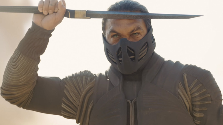 Duncan Idaho lifts a blade to his forehead in Dune: Part Three