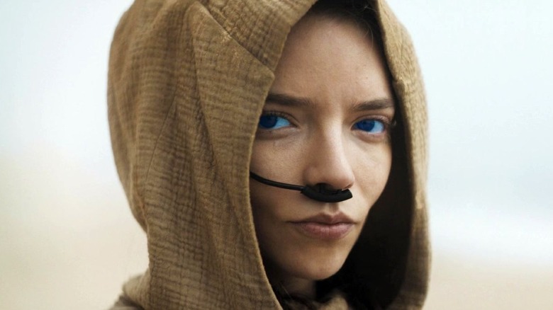 Anya Taylor-Joy as Alia Atreides wears a hood in Dune: Part Two