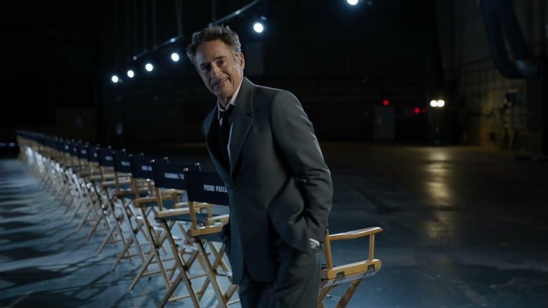 Robert Downey Jr. standing by all of the chairs in the Avengers: Doomsday cast announcement video
