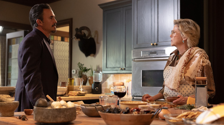 Joaquin (Juan Pablo Raba) looking at Beulah (Annette Bening) on 