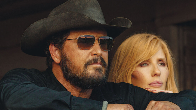 Rip Wheeler (Cole Hauser) and Beth Dutton (Kelly Reilly) standing next to each other on Dutton Ranch