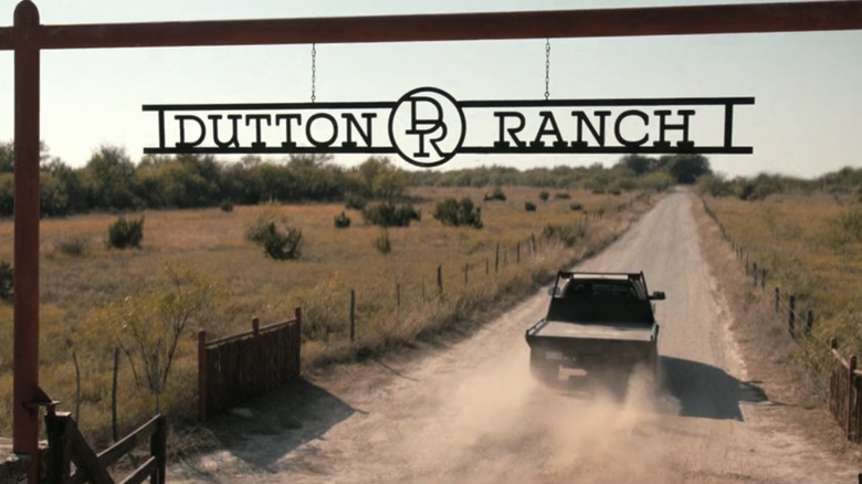 A truck drives underneath the Dutton Ranch entrance in Dutton Ranch
