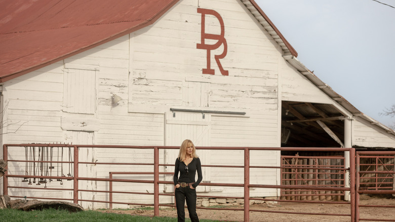 Kelly Reilly's Beth Dutton stands outside her ranch home in Dutton Ranch