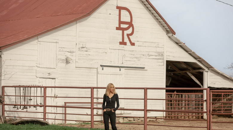 Kelly Reilly's Beth Dutton stands outside her ranch home in Dutton Ranch