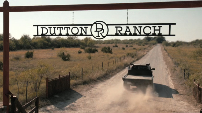 A truck drives underneath the Dutton Ranch entrance in Dutton Ranch