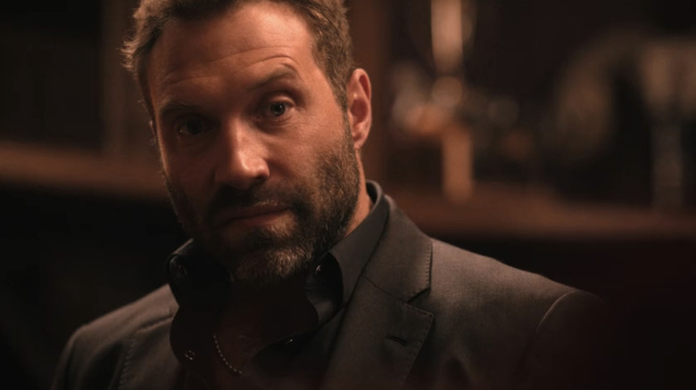 Jai Courtney's Rob-Will Jackson looks intense in closeup in Dutton Ranch