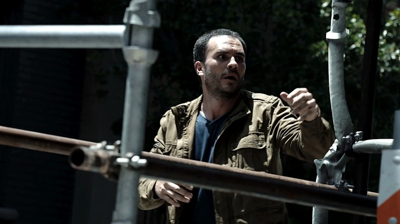Juan Pablo Raba's Joey Gutierrez looks shocked as he stands in a street in Agents of S.H.I.E.L.D
