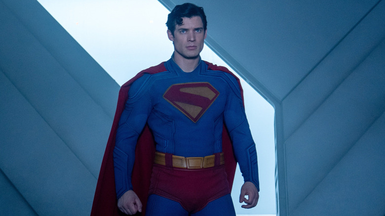 David Corenswet as Superman standing with a stern look on his face in Superman (2025)
