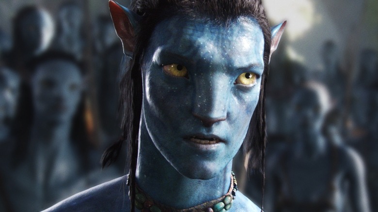 Sam Worthington as Jake Sully talking to the Na'vi tribe in Avatar