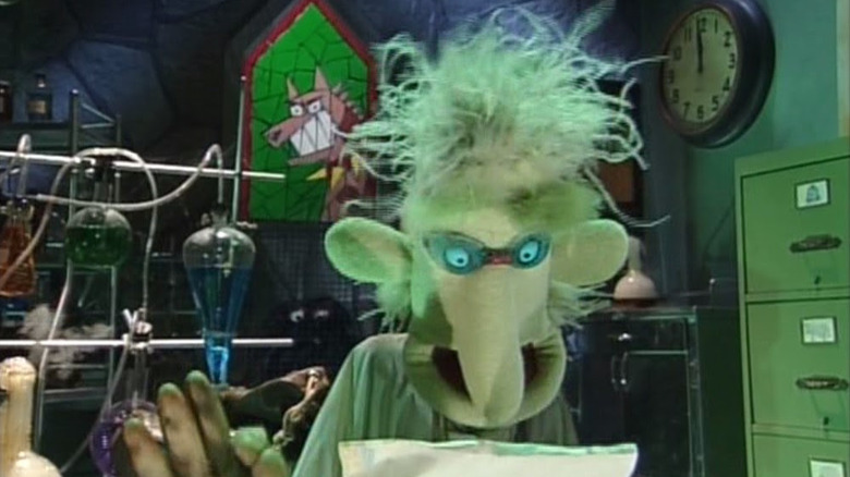 Dr. Phil Van Neuter reading a letter
