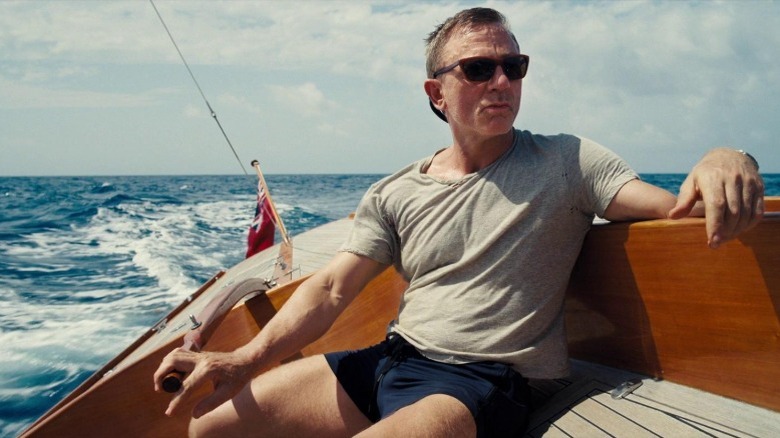 James Bond steers boat in Jamaica