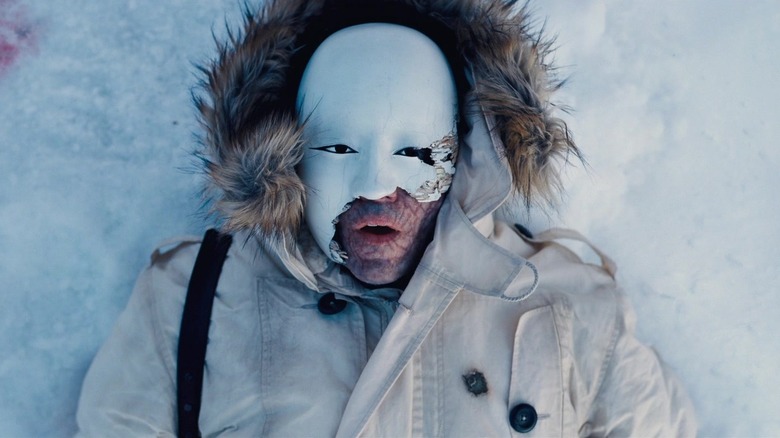 Lyutsifer Safin in mask lies the snow
