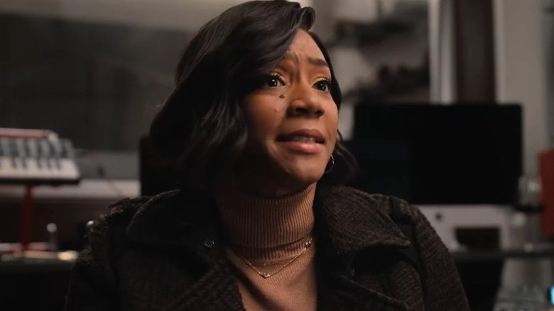 Tiffany Haddish grimacing
