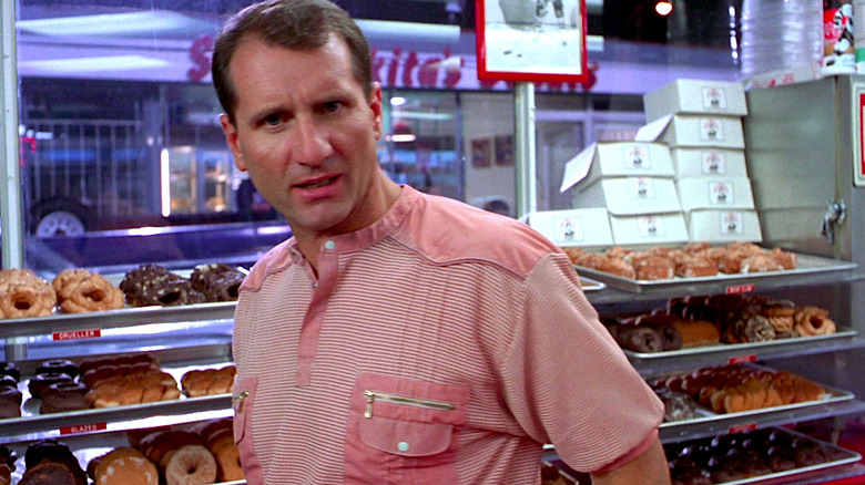 Ed O'Neill talks to the camera in Wayne's World