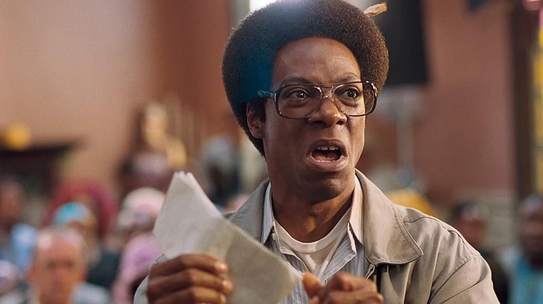 Norbit Rice, angry holding some papers, in the movie Norbit