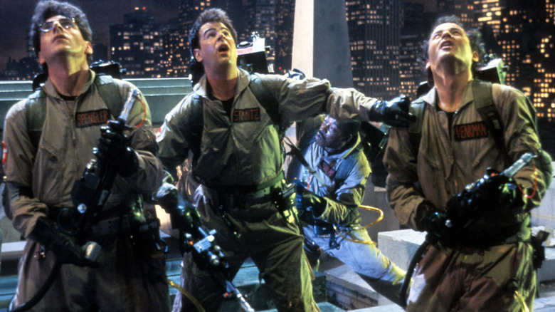 Egon Spengler, Ray Stantz, and Peter Venkman staring at the sky in Ghostbusters