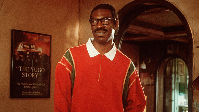 Eddie Murphy as Jif Ramsey standing in Bobby's office in Bowfinger