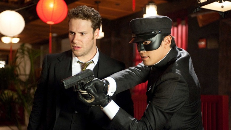 Britt Reid and Kato with a mask and a gun in The Green Hornet