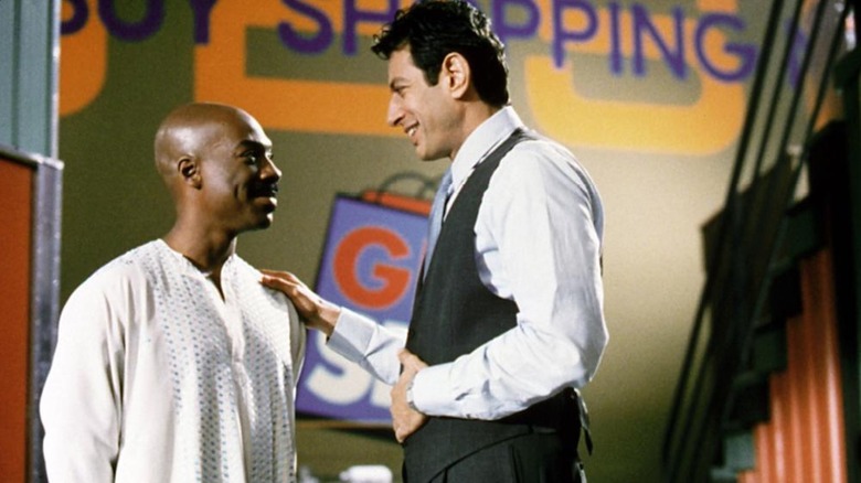 Jeff Goldblum as Ricky Hayman asks for wisdom from Eddie Murphy as G in Holy Man