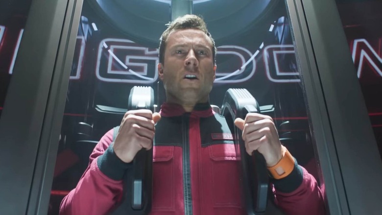 Ben Richards strapped to a chair in The Running Man