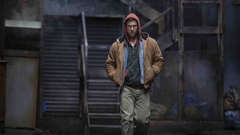 Glen Powell as Ben Richards looking intense in The Running Man