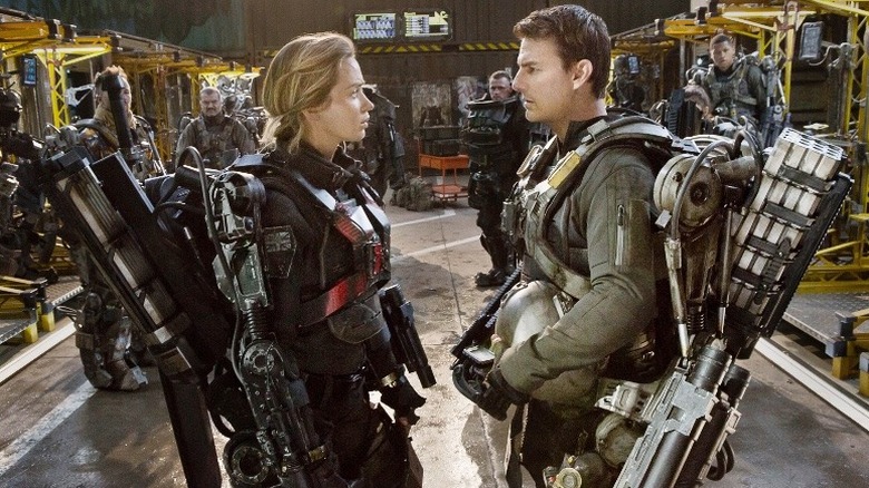 Emily Blunt and Tom Cruise having a stare-off