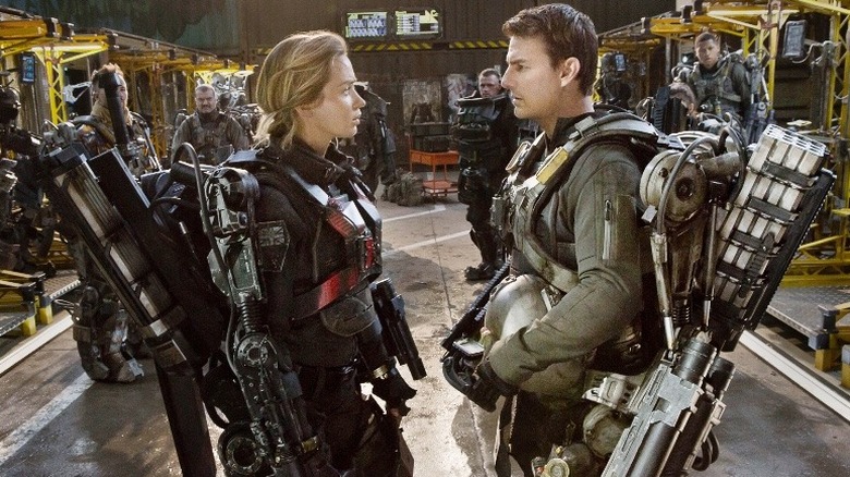 Emily Blunt and Tom Cruise having a stare-off