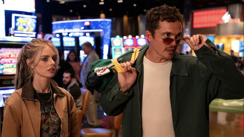 Edie and John walk the casino floor in Eenie Meanie